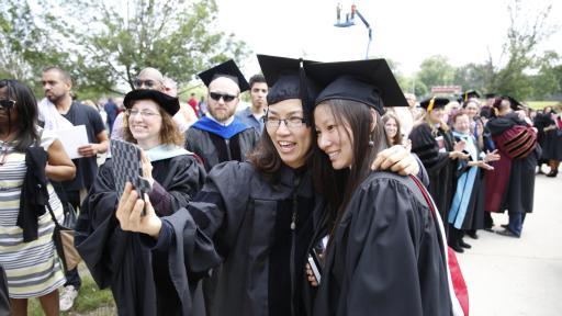 professor and student taking selfie